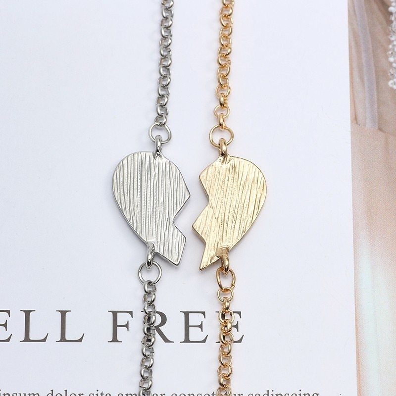 Heart-shaped gold and silver best friends bracelets with English letters.