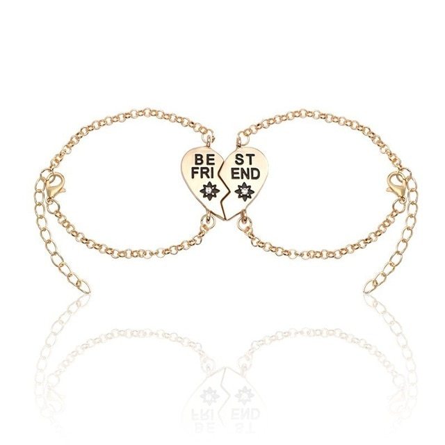 Gold heart-shaped best friends bracelets with English letters spelling "BEST FRIEND" and adjustable chains