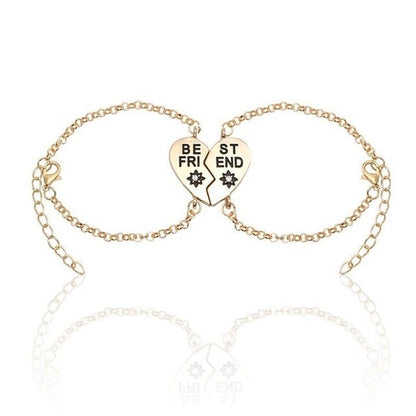 Gold heart-shaped best friends bracelets with English letters spelling "BEST FRIEND" and adjustable chains