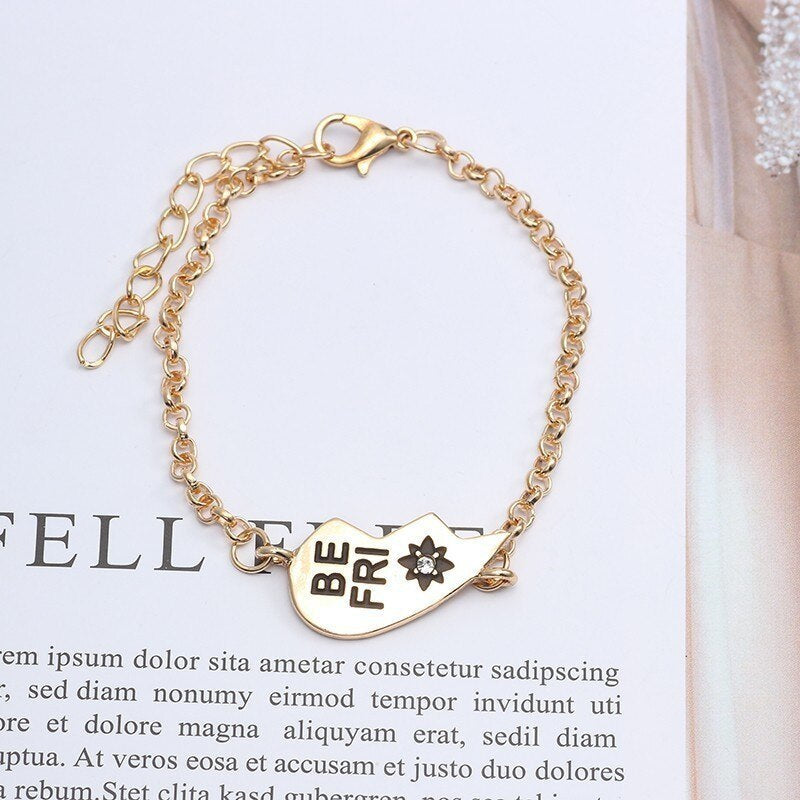 Gold alloy heart-shaped bracelet with "BE FRI" English letters for best friends, featuring inlaid artificial gems.