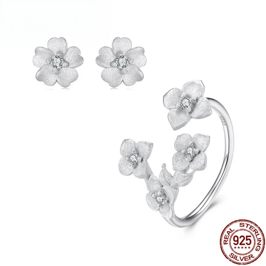 Silver Flower  Ring, and Stud Earrings.