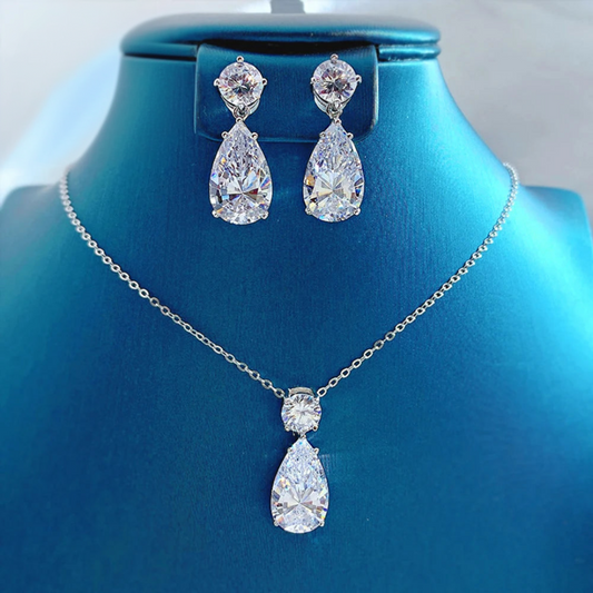 Silver Luxury Pendant Necklace/ Stud Earrings.